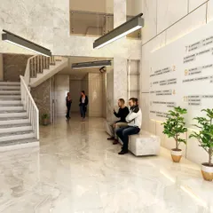A 3D render of the main lobby for the upcoming 'AURA - Sky Tower' in Nashik. The design for this 12-story commercial building features a double-height entrance, marble-clad surfaces, and a clear directory system for a grand and welcoming first impression.