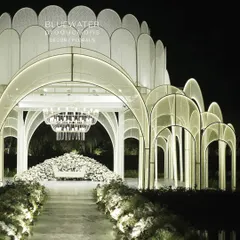 For this lakeside reception, we designed and built a floating palace. The entire structure, clad in delicate lace and illuminated from within, created a breathtaking, ethereal glow over the water.