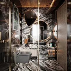 A truly unique bathroom design featuring dramatic, richly-veined marble and a custom-designed, free-form backlit mirror. The wall-mounted grey toilet and glass partition add to the modern, spacious feel.