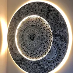 Brighter and better. This backlit mandala is a showstopper, combining detailed freehand drawing with modern lighting to create a truly unique piece of wall decor.