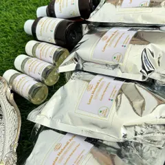 A top-down view of my henna products, showing the quality packaging that keeps the powder fresh and the oils pure.