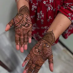 A beautiful, full-hand design perfect for Teej or any festival. This style uses traditional paisley and floral motifs to create a rich and celebratory look.