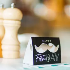 A "Happy Father's Day" card sits on a table at Terra. We pay attention to the small details to make every celebration special for you and your loved ones.