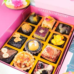 This assorted box of 12 festive confections is a journey of flavors. It includes a variety of my signature brownies, fusion tarts, and Indian-inspired sweets, making it a perfect gift for families and corporate clients during Diwali.