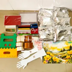 A complete kit for aspiring and professional mehendi artists. It includes everything I use myself: filtered henna powder, cellophane sheets, acrylic practice hands, a portable folding table, and even a weighing scale for perfect paste mixing.