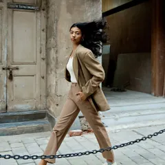 Taking our session to the streets of Mumbai, we captured this dynamic shot. I love using the city's architecture and energy as a backdrop, creating environmental portraits that feel alive with movement and story.