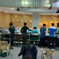 A glimpse of a typical training day at the Eminent Shooting Range. The image shows the layout of the lanes, the electronic target systems, and the focused atmosphere I cultivate for my shooters.