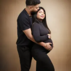 A love story in the making. This portrait captures the quiet intimacy and shared dreams of a couple awaiting the tiny heartbeat that will soon fill their world with joy.