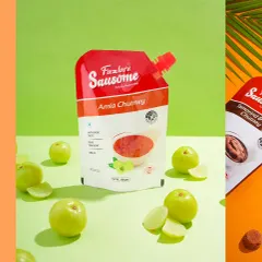 For this chutney pouch, I used a vibrant green background and fresh ingredients like amla to communicate the product's flavor. This technique of deconstructing the ingredients helps tell a story of freshness and quality.
