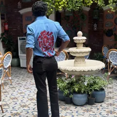 The full view from the back, revealing the scale and impact of the hand-painted artwork. This shirt is designed to be a conversation starter from every angle.