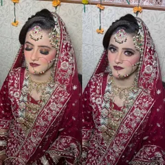 Here you can see the flawless HD makeup base and the contouring that defines her features. The eyes are the focus, with a blend of gold and dark shades, while the deep red lip completes this classic Barat bride look.