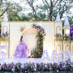 A fairytale comes to life with this grand princess castle backdrop. I use custom-built props, marquee letters for the child's name, and coordinated floral arrangements to create a truly royal celebration for milestone birthdays.