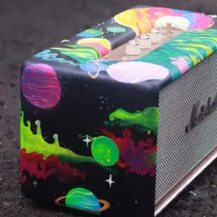 A close-up of the side of the custom Marshall speaker, showing the vibrant, swirling colors of the galaxy.