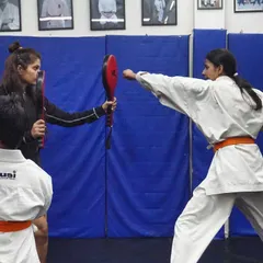 Developing a powerful punch is about more than just arm strength. Through pad drills, I teach my students proper form, how to generate power from their entire body, and how to strike with accuracy.