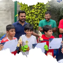 Meet our winners. A proud moment for these young champions and their coaches at our Sports Fiesta, holding their well-earned trophies and certificates. This is what dedication and teamwork look like.