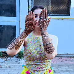 My dear niece, my baccha, on her mehandi day. It was a day of mixed emotions, with tears of joy and a heart full of love as I adorned her hands for her new life.