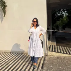 Grace and confidence in a classic white kurta. I guide clients on styling ethnic and fusion wear that feels authentic and looks polished, perfect for professional settings that value cultural roots.