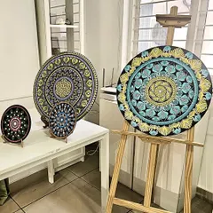 The stunning results of our dot mandala workshop. Participants learn this meditative art form and create intricate masterpieces to take home.