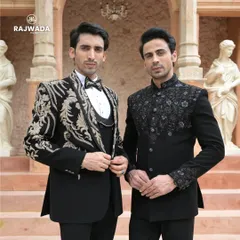Two distinct styles from the Crown & Collar line. On the left, a tuxedo with bold gold embroidery, and on the right, a bandhgala with delicate black-on-black floral work, showing the range from opulent to subtle.