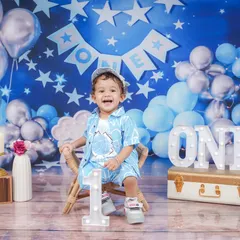 A first birthday is a huge milestone, and I love capturing the pure happiness of the moment. This 'Twinkle Twinkle Little Star' theme is one of my most popular setups for celebrating the big ONE.