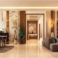 This open-plan layout shows how we seamlessly connect living and dining areas. The consistent use of warm wood, metallic accents, and polished marble flooring creates a harmonious flow throughout this luxury apartment interior.