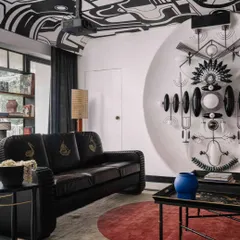 Dubbed our 'Sistine Chapel', this project involved hand-painting an abstract labyrinth pattern across an entire ceiling. The black-and-white design creates a dramatic, graphic overhead landscape, turning the fifth wall of the room into the main event.