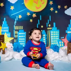 Our little superman is ready to save the day! Themed shoots like this superhero session are a fantastic way to celebrate a first birthday with energy and fun.