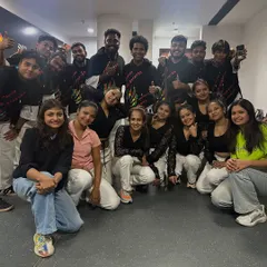 The full performance crew backstage after the INBL opening ceremony. We scale our team based on your event's needs, from a small workshop facilitator to a large troupe of professional dancers.