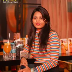 Chilling at the bar with a drink in hand. It's the perfect spot to catch up with friends or just soak in the energetic atmosphere of a night at K-OS.