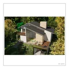 An aerial view of The Ridgeway Escape in Coorg, showing how the rooflines and terraces are integrated into the sloping hillside. The design works with the topography of the land, not against it.