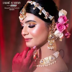 A detailed shot of a contemporary bride, focusing on the flawless makeup and elegant hair styling. This is the level of perfection we train our students to achieve for their clients.