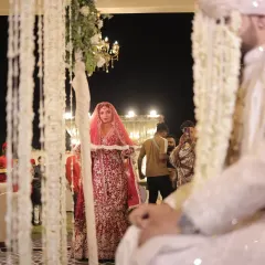The bride's first look at her groom during the ceremony. I captured this moment of anticipation from the groom's perspective, creating a powerful, story-driven image.