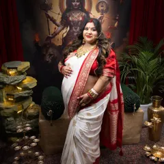 Every woman is a goddess, and this mom-to-be embodies the strength and grace of Durga Maa. This culturally rich, traditional maternity portrait was a joy to create.
