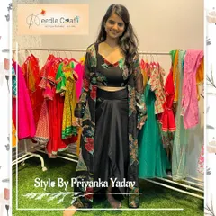 This Indo-Western outfit shows the true versatility of upcycling. I used a client's saree to create a coordinated set with a drape skirt and a sheer jacket, proving that you can get a trendy, multi-piece look from a single garment.