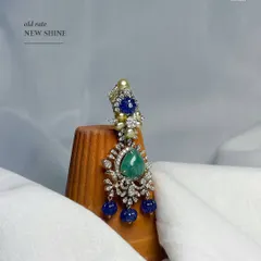 If there was one earring you should carry to all your wedding destinations, it should be this one. This versatile emerald, sapphire and diamond earring is now available at the old gold rate.