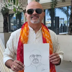 Each portrait is a quick, expressive sketch done with graphite. I focus on capturing a likeness and a bit of personality in just a few minutes, so more of your guests get a chance to have their portrait done. This gentleman was a great sport at a wedding in Janakpuri.
