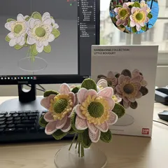I was inspired by an AI image to create this real-life crochet flower bouquet in its own little stand. It was a fun experiment to see if I could replicate the digital art with yarn and a hook.