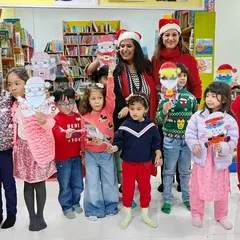 Our little bookworms showing off the Santas they created during our Christmas craft activity. It's wonderful to see children and parents working together, bringing their creative ideas to life.
