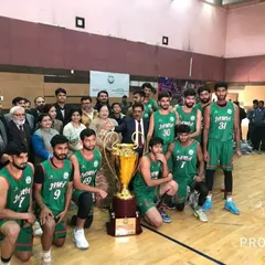 The victorious Jamia basketball team posing with the North Zone trophy and university officials. Organizing the post-event prize distribution and ensuring all dignitaries are hosted properly is a key part of my event management service.