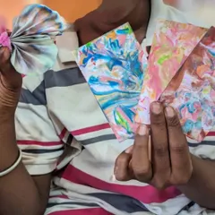 A reminder for our "Home Chemistry" workshop for homeschooled students. This image shows the beautiful results of marble paper art, made by learning about hydrophobic substances.