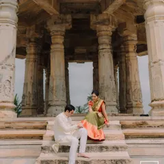 Set against the grandeur of a heritage temple, this pose captures a sense of timeless elegance. I love blending the richness of classic architecture with the personal story of a couple's love.