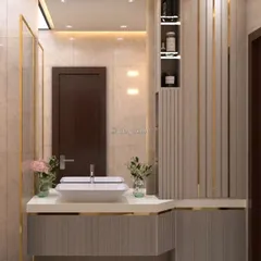Indulge in modern elegance with this bathroom design. I used floor-to-ceiling tiles, gold-trimmed cabinetry, and a sleek vessel sink to create a space that whispers luxury in every detail.