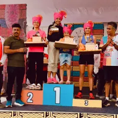 This is what true success looks like for me: standing on the podium with my daughter by my side. As a running mom, I know the juggle is real, but I believe that when moms pursue their passion, they teach their children the power of possibility.