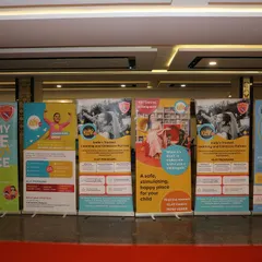 A display of branded standees and informational banners at the Klay event. I ensure your school's brand and message are prominently and professionally displayed throughout the venue.