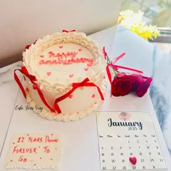 Celebrating 12 years of love with this custom anniversary cake. I love adding personal touches like the calendar marking the special date and a handwritten message.