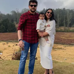 A classic family portrait from our trip to Ooty. This photo captures a happy, relaxed moment against a beautiful natural backdrop, perfect for content that feels both aspirational and achievable for young families.