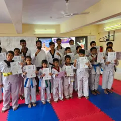 More happy faces from our belt promotion ceremony. Each certificate represents a new level of skill and commitment.