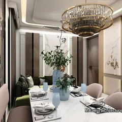 A beautifully set dining table, ready for guests. This view highlights the harmony between the plush dining chairs, elegant tableware, and the ambient lighting from the grand chandelier above.