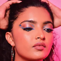 A close-up of this creative rhinestone look. I carefully placed each gem to create a sparkling, graphic design that catches the light and draws attention to the eyes.