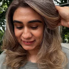 Another look at my 'Vanilla Butter Cream' creation. This is a fantastic way to blend grey hair into a stylish, modern blonde look. The ash tones help neutralize any brassiness for a cool, creamy finish.